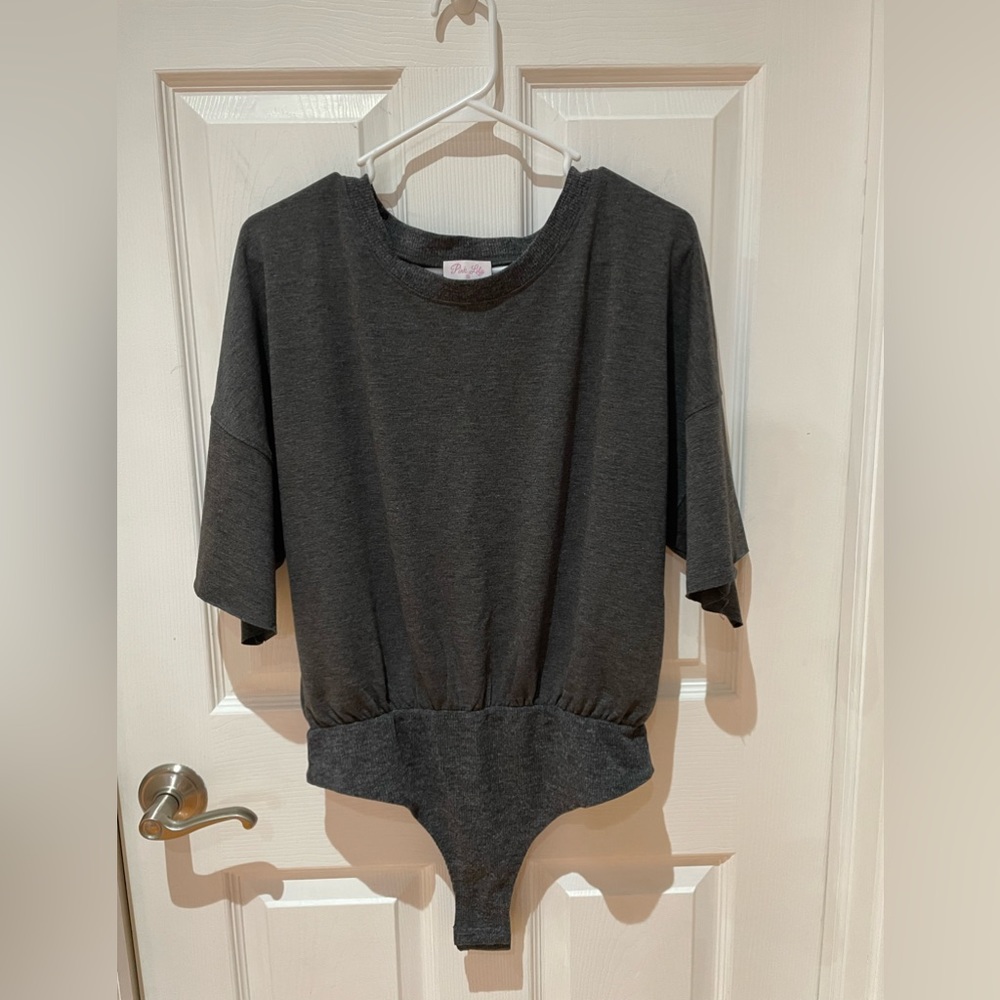 New in package from Pink Lily dark gray short sleeve bodysuit